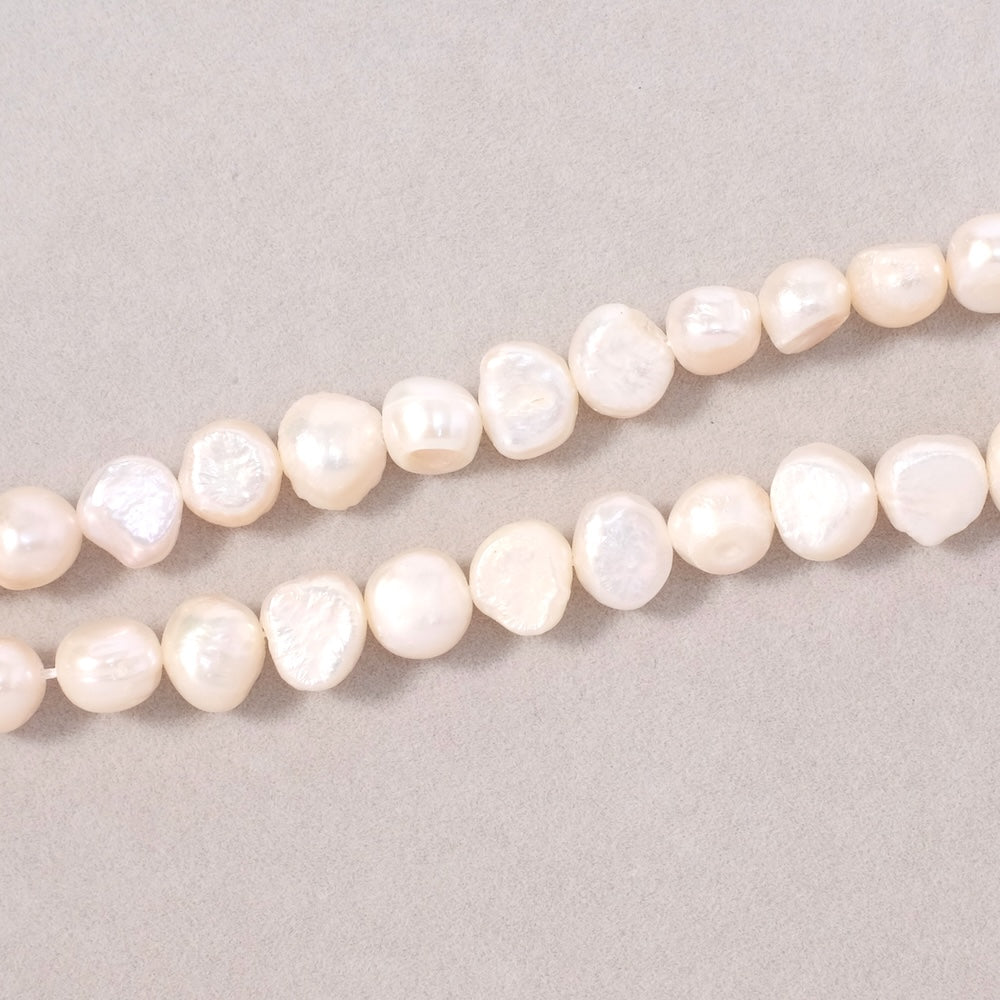 Fil de perles 8mm irrégulières de Nacre naturelle