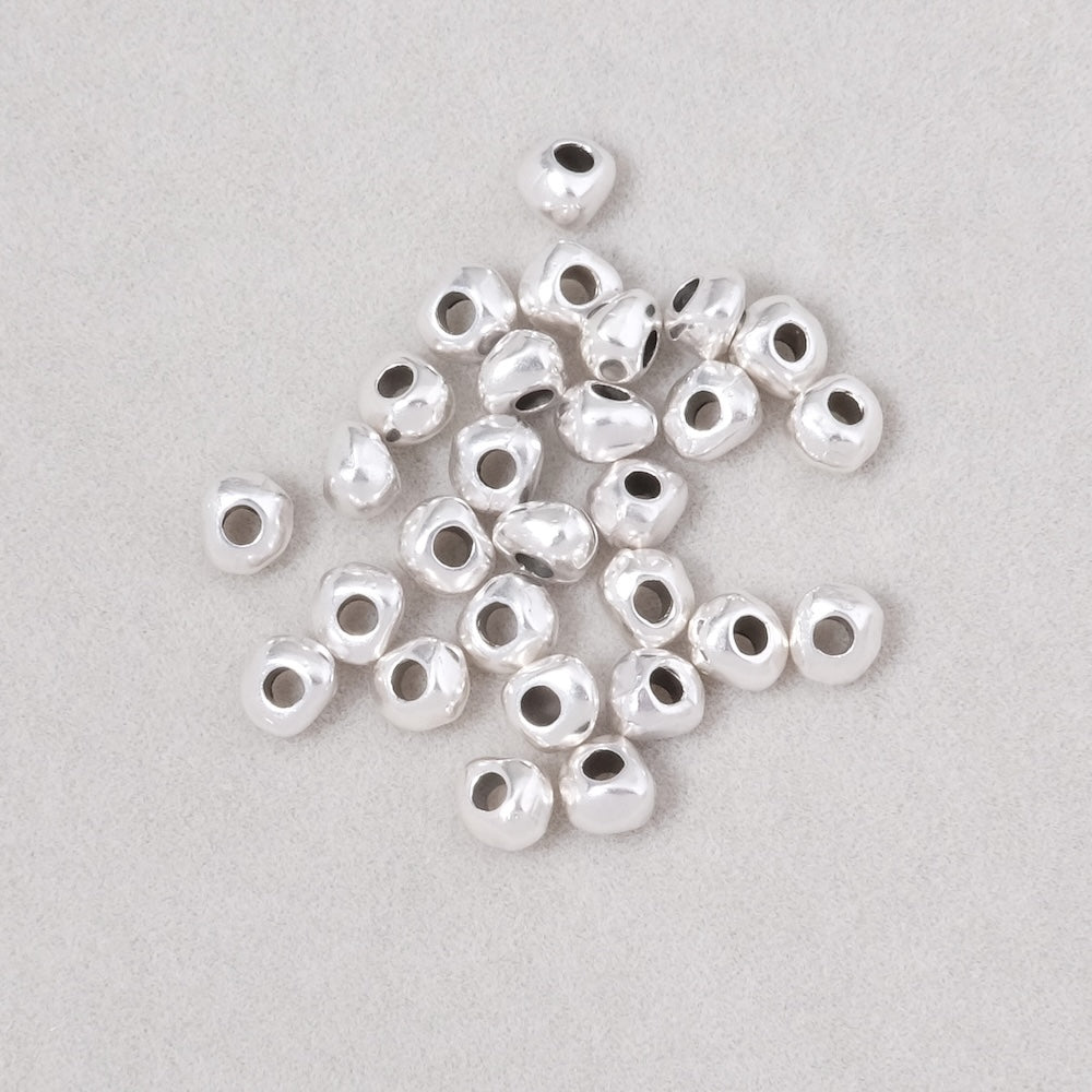 10 perles pépites 4mm en métal Argenté