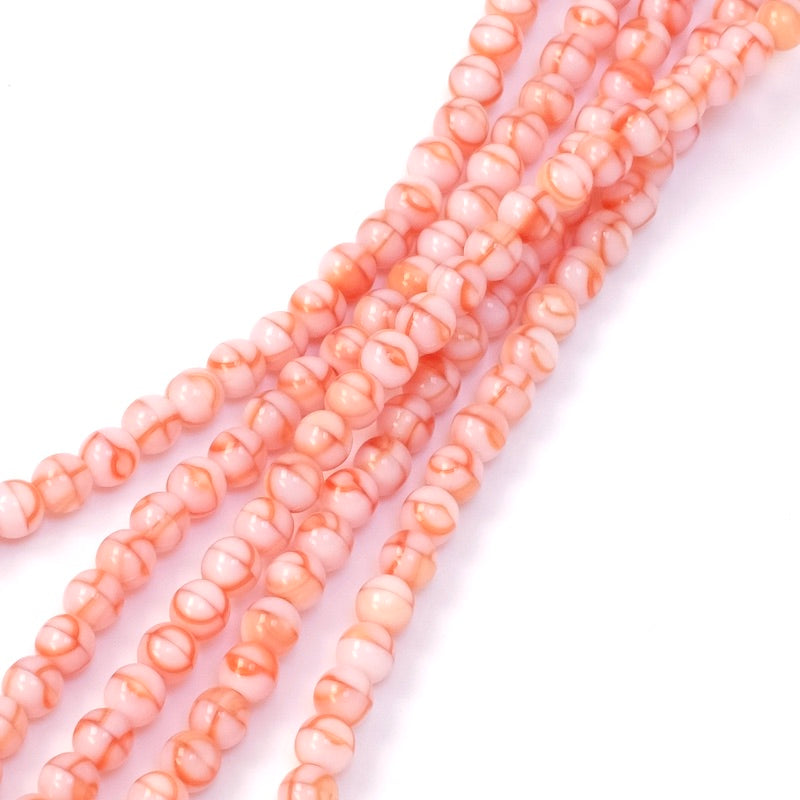 Fil de perles de Bohème rondes 4mm nuances de rose orangé