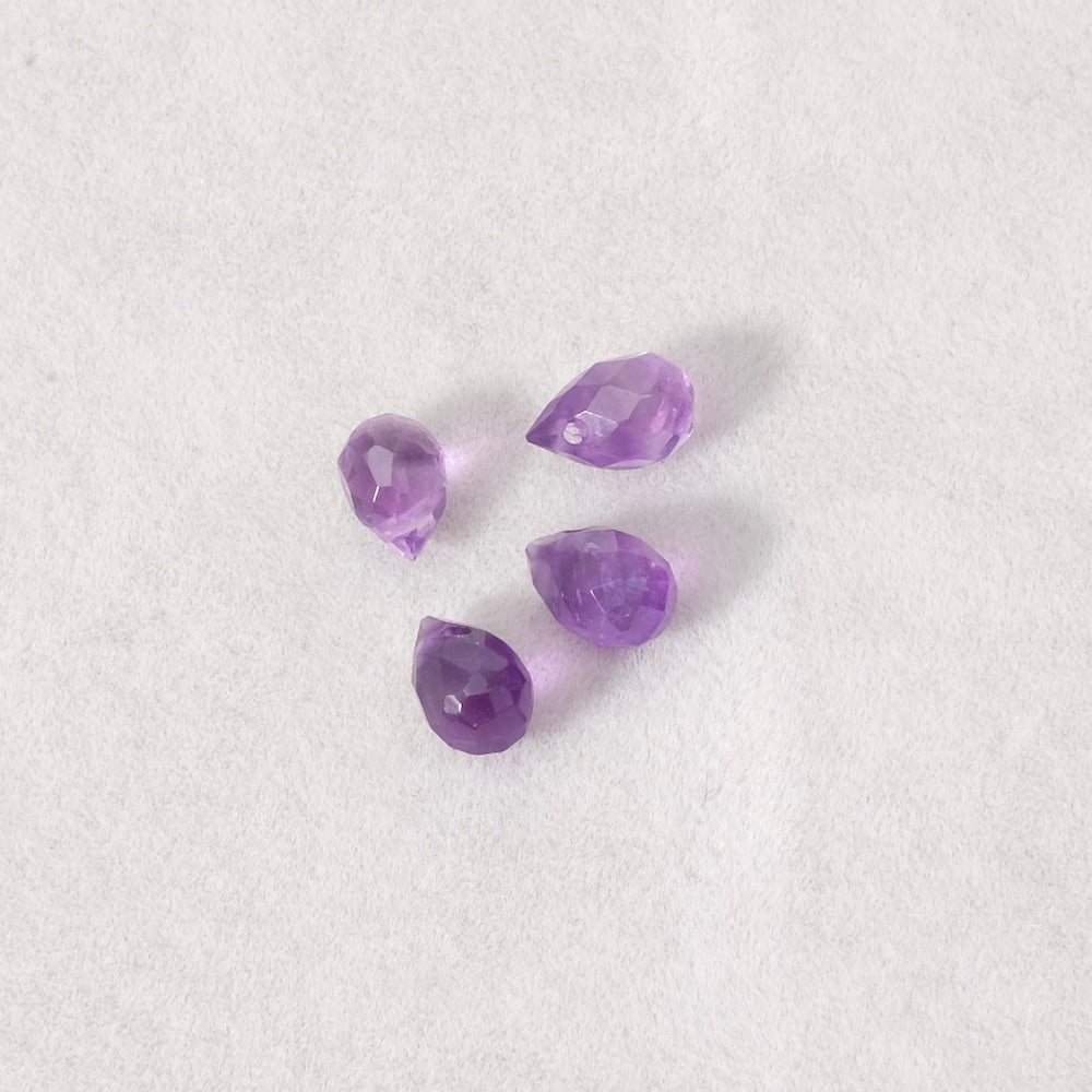 Fil de perles naturelles gouttes facettées 5x7mm en Améthyste